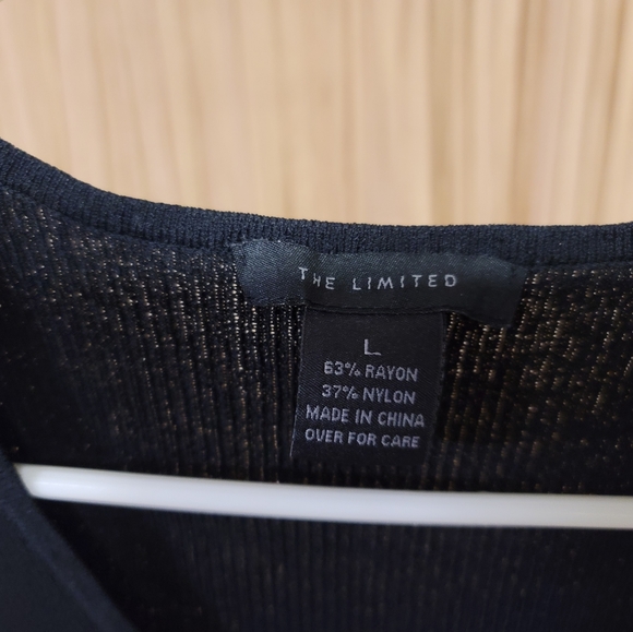 The limited Black sleeveless top with embelishment. - Picture 2 of 2